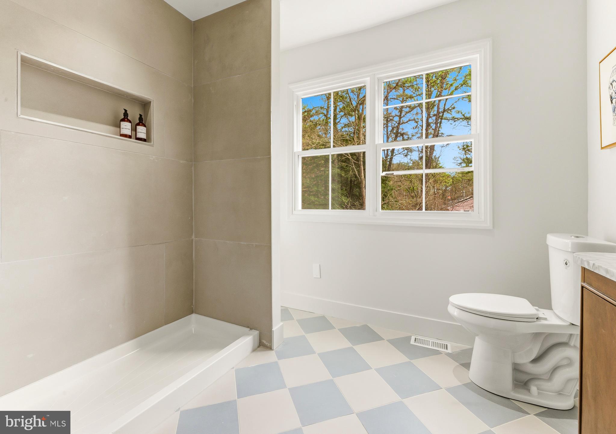 2470 Medford Road Atco, NJ 08004 - Photo 20 of 22 a bathroom with a sink toilet and shower