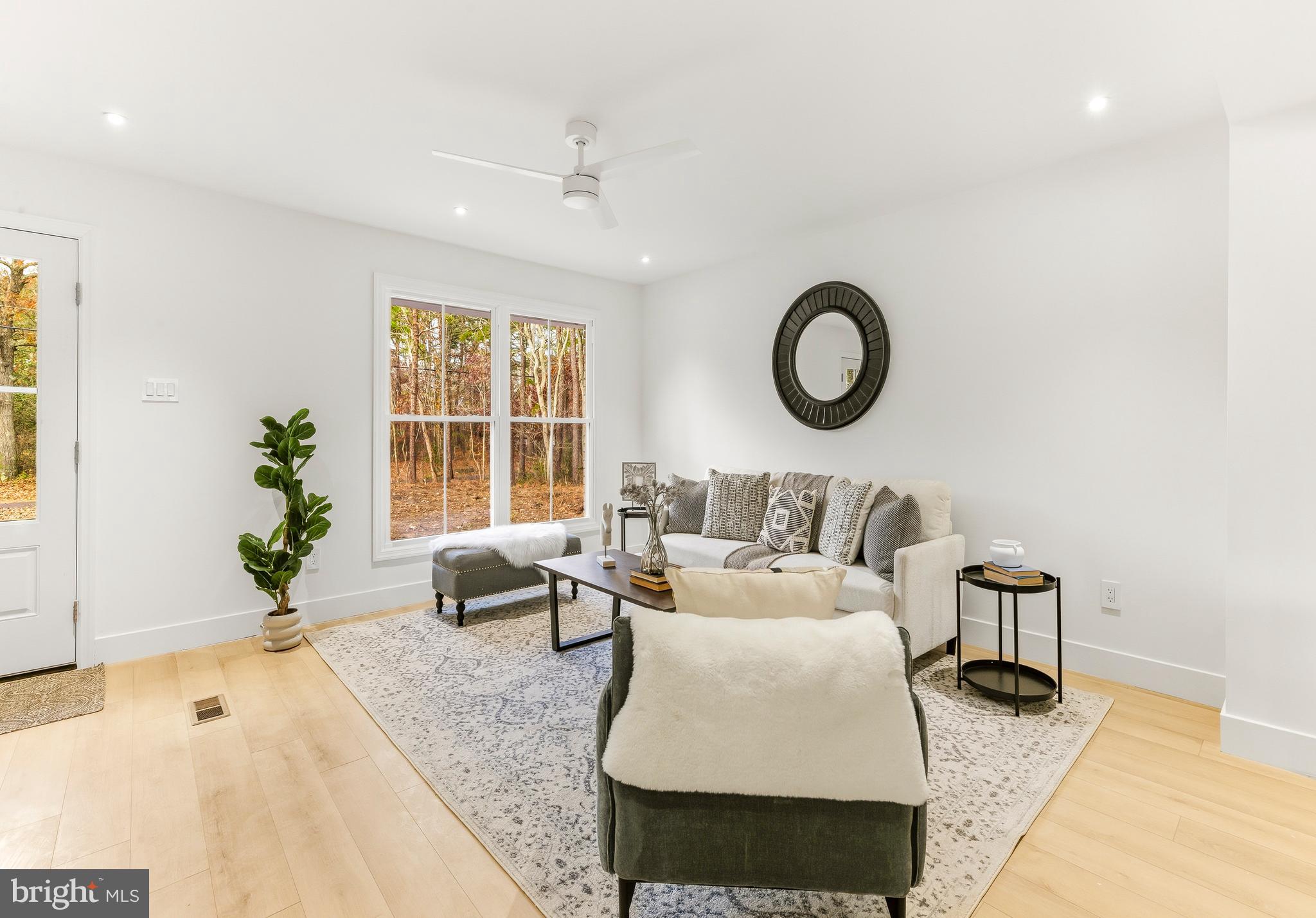 2470 Medford Road Atco, NJ 08004 - Photo 4 of 22 a living room with furniture and a large window