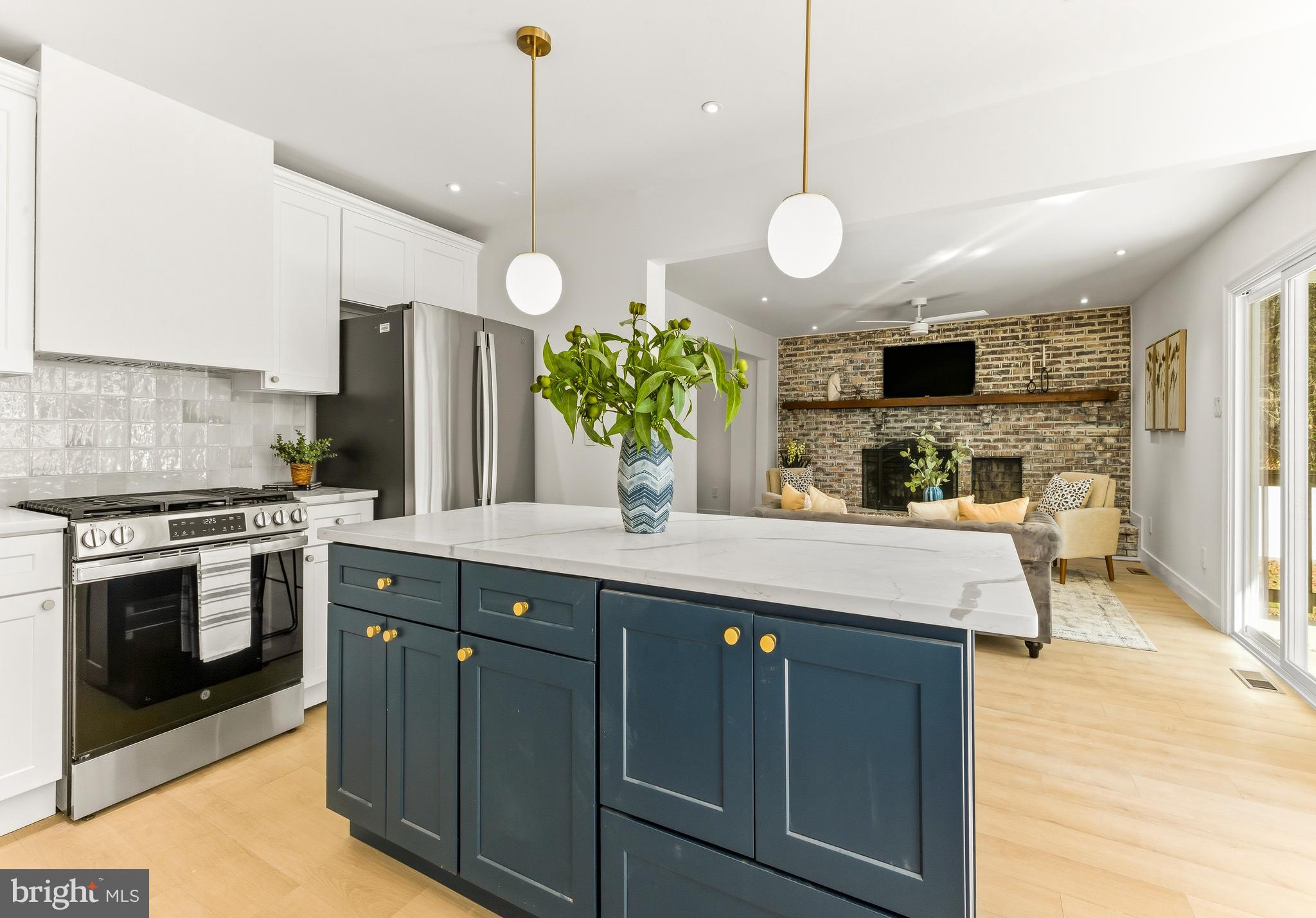2470 Medford Road Atco, NJ 08004 - Photo 10 of 22 a kitchen with a stove and a view of living room