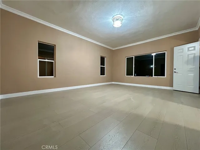 en empty room with windows