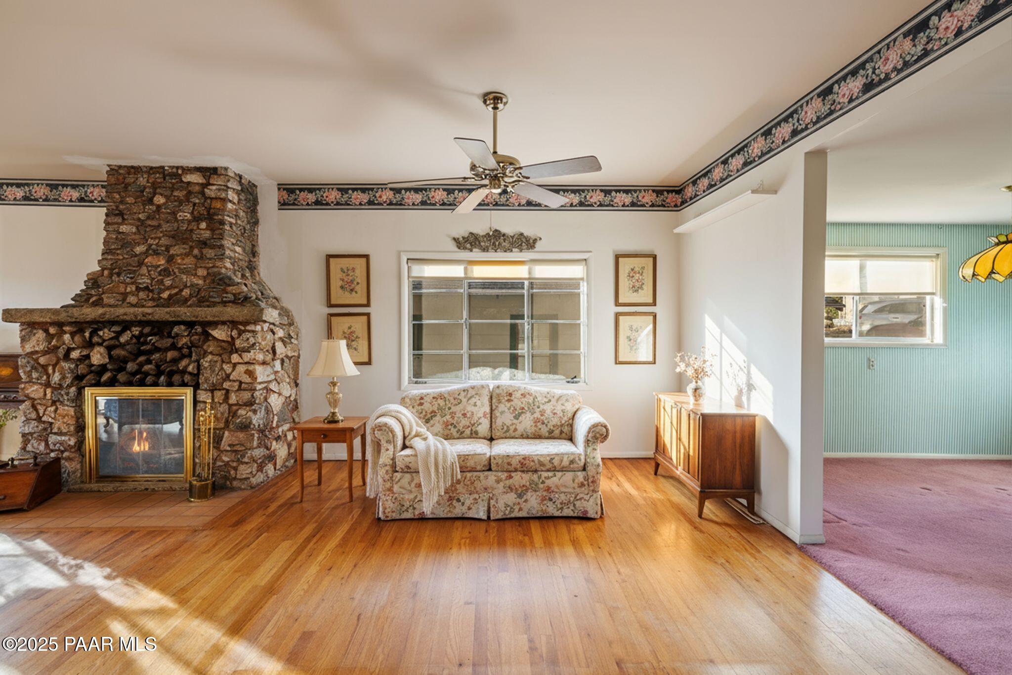 224 Congress Avenue Prescott, AZ 86303 - Photo 11 of 59 a living room with furniture and a fireplace