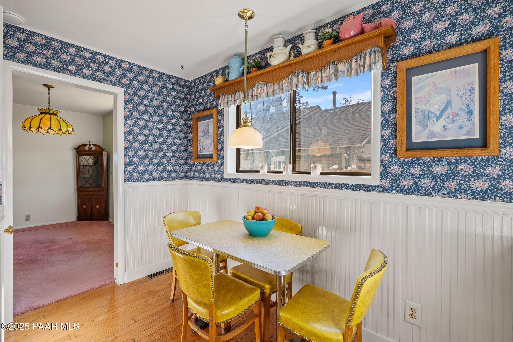 224 Congress Avenue Prescott, AZ 86303 - Photo 21 of 59 a view of a dining room with furniture window and outside view