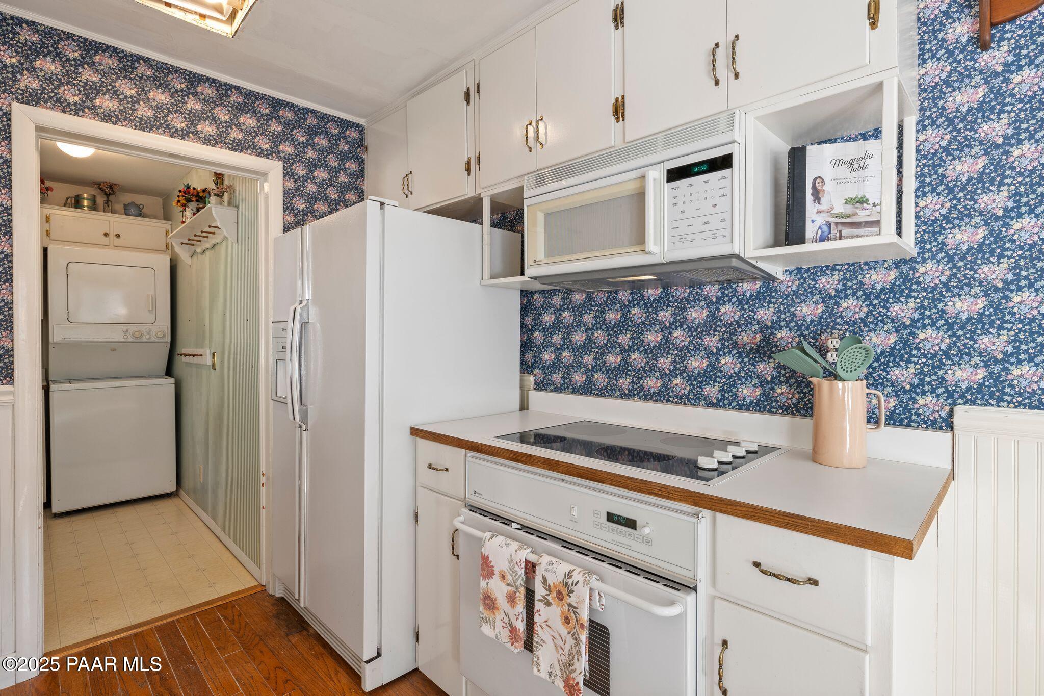 224 Congress Avenue Prescott, AZ 86303 - Photo 24 of 59 a kitchen with stainless steel appliances granite countertop a refrigerator and a sink