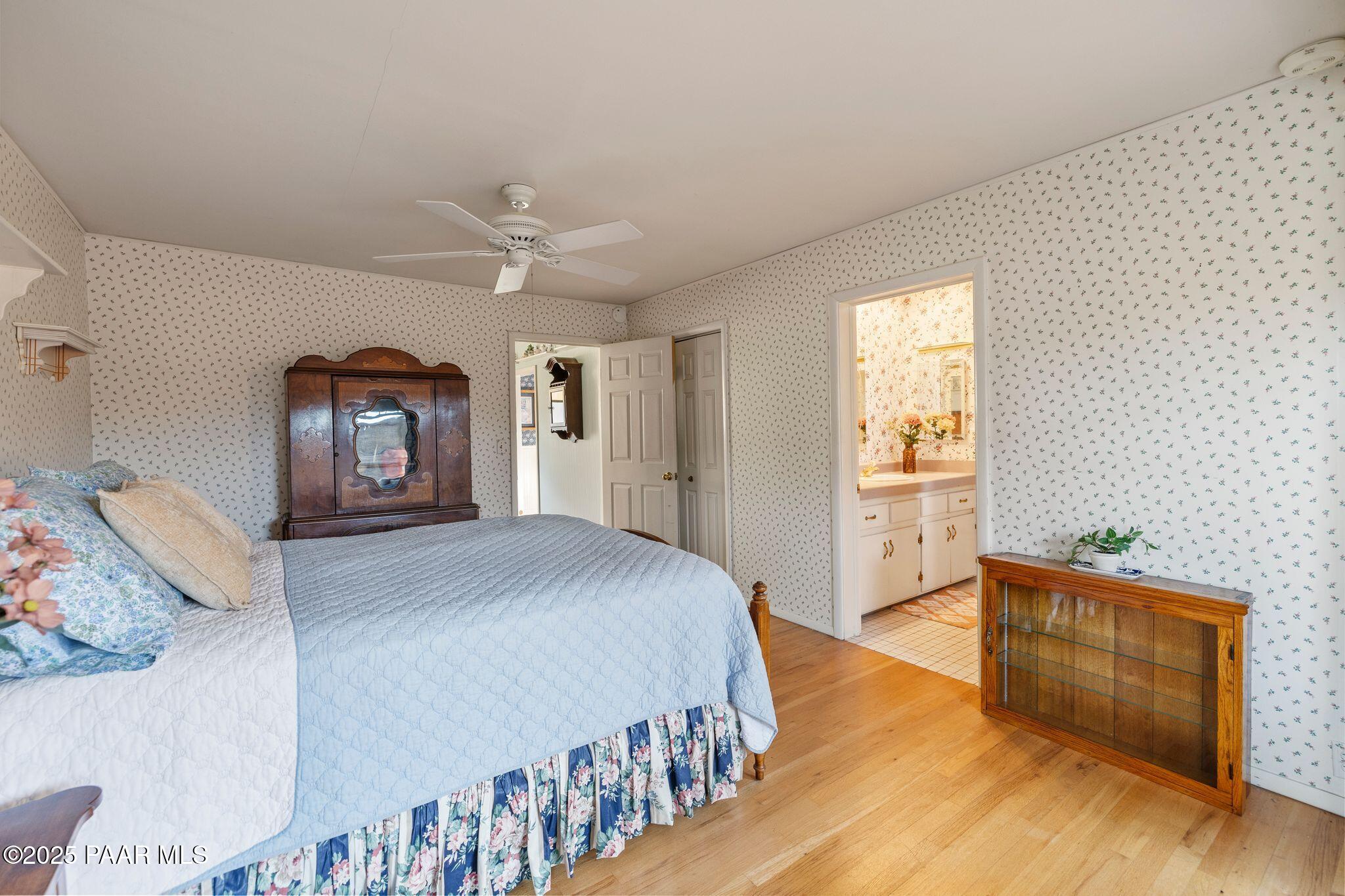 224 Congress Avenue Prescott, AZ 86303 - Photo 27 of 59 a bedroom with a bed and a dresser