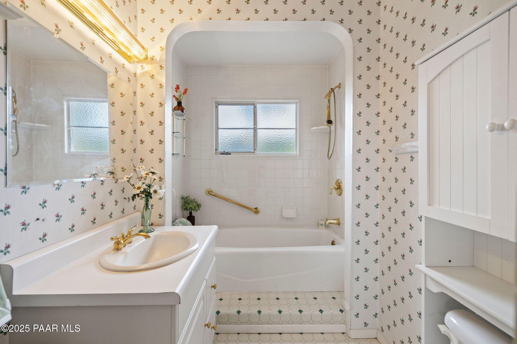 224 Congress Avenue Prescott, AZ 86303 - Photo 34 of 59 a bathroom with a sink a bathtub and a shower