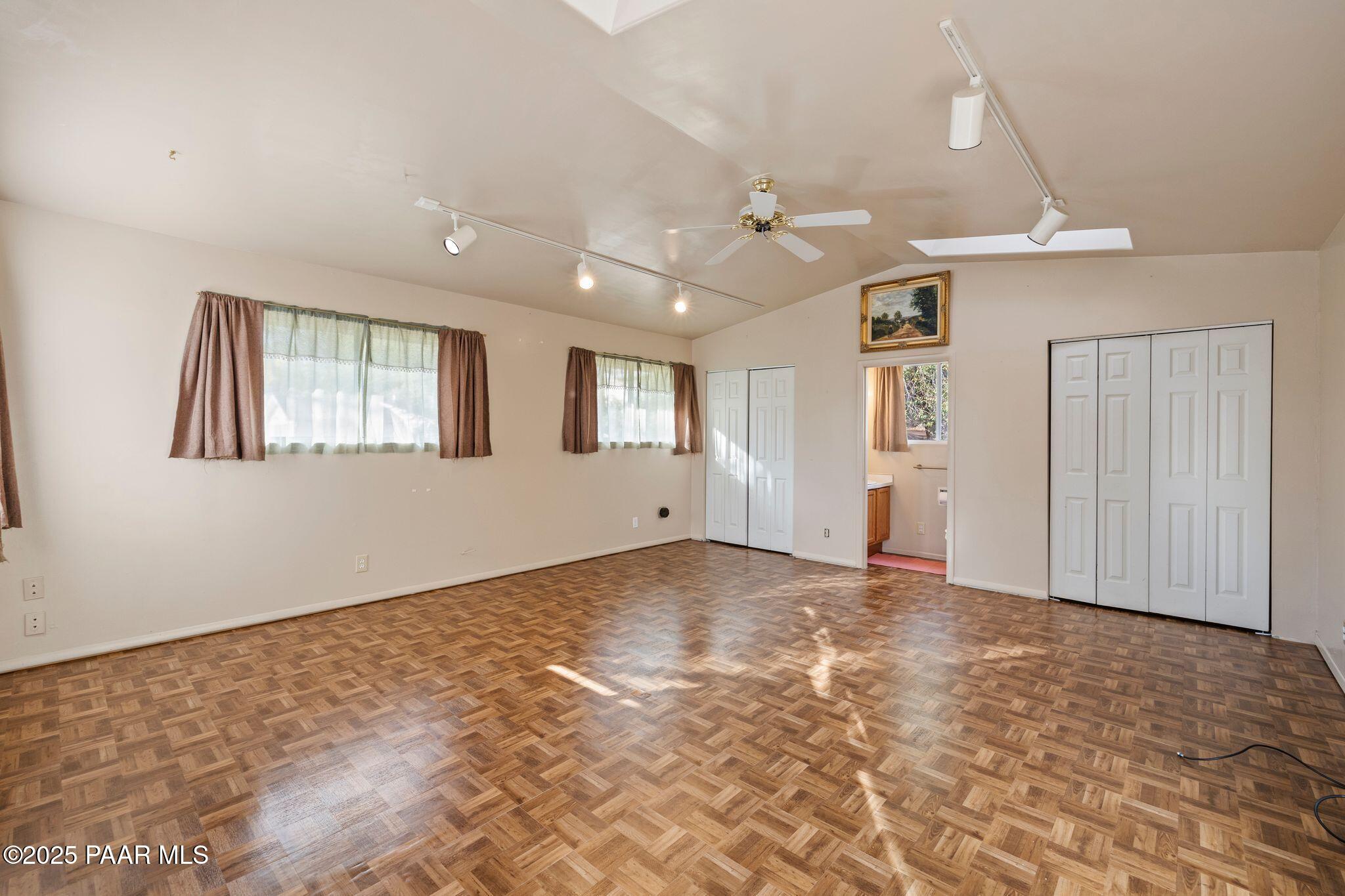 224 Congress Avenue Prescott, AZ 86303 - Photo 39 of 59 a view of an empty room with window and wooden floor