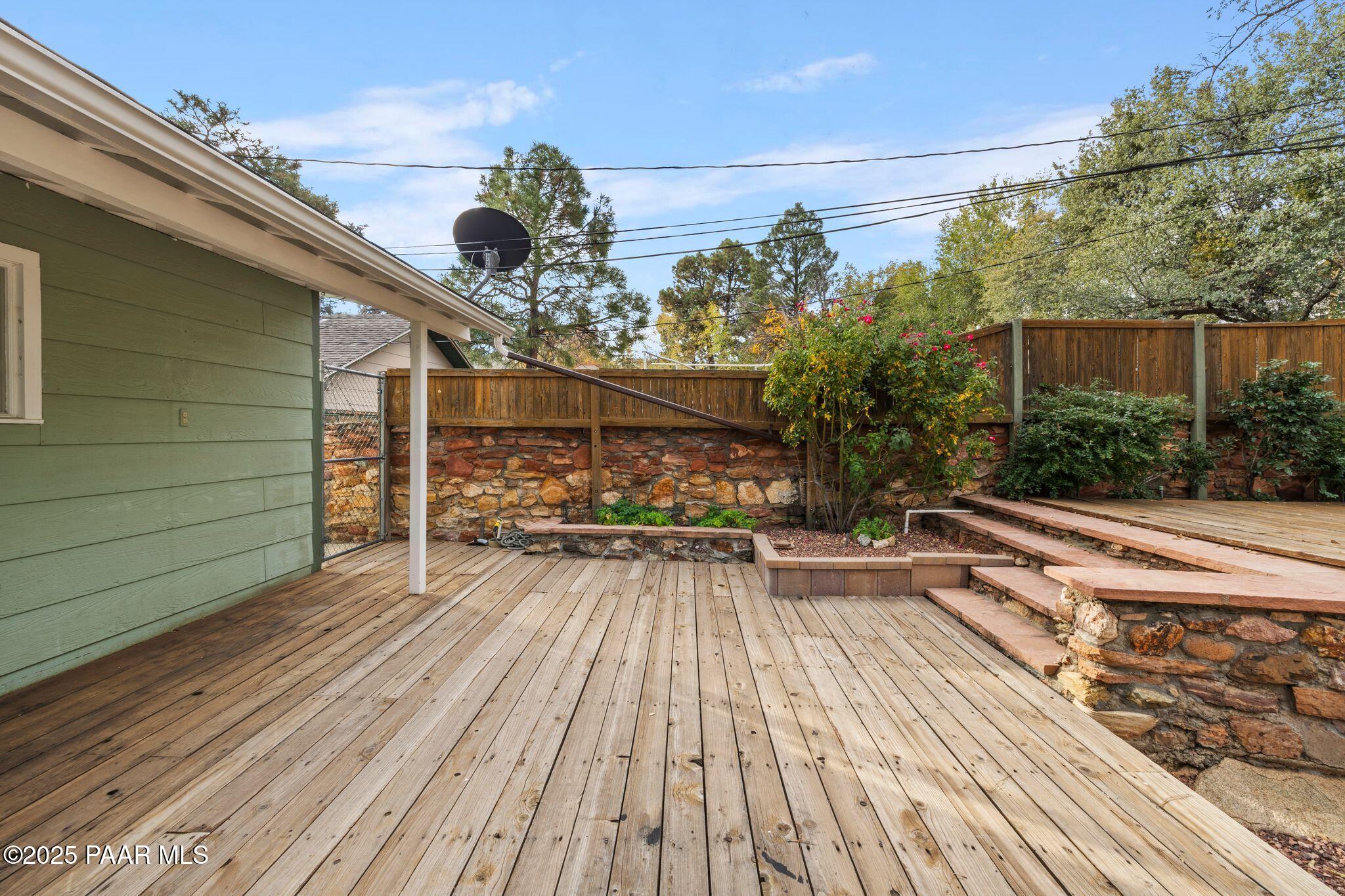 224 Congress Avenue Prescott, AZ 86303 - Photo 46 of 59 a view of a balcony with chairs and wooden floor
