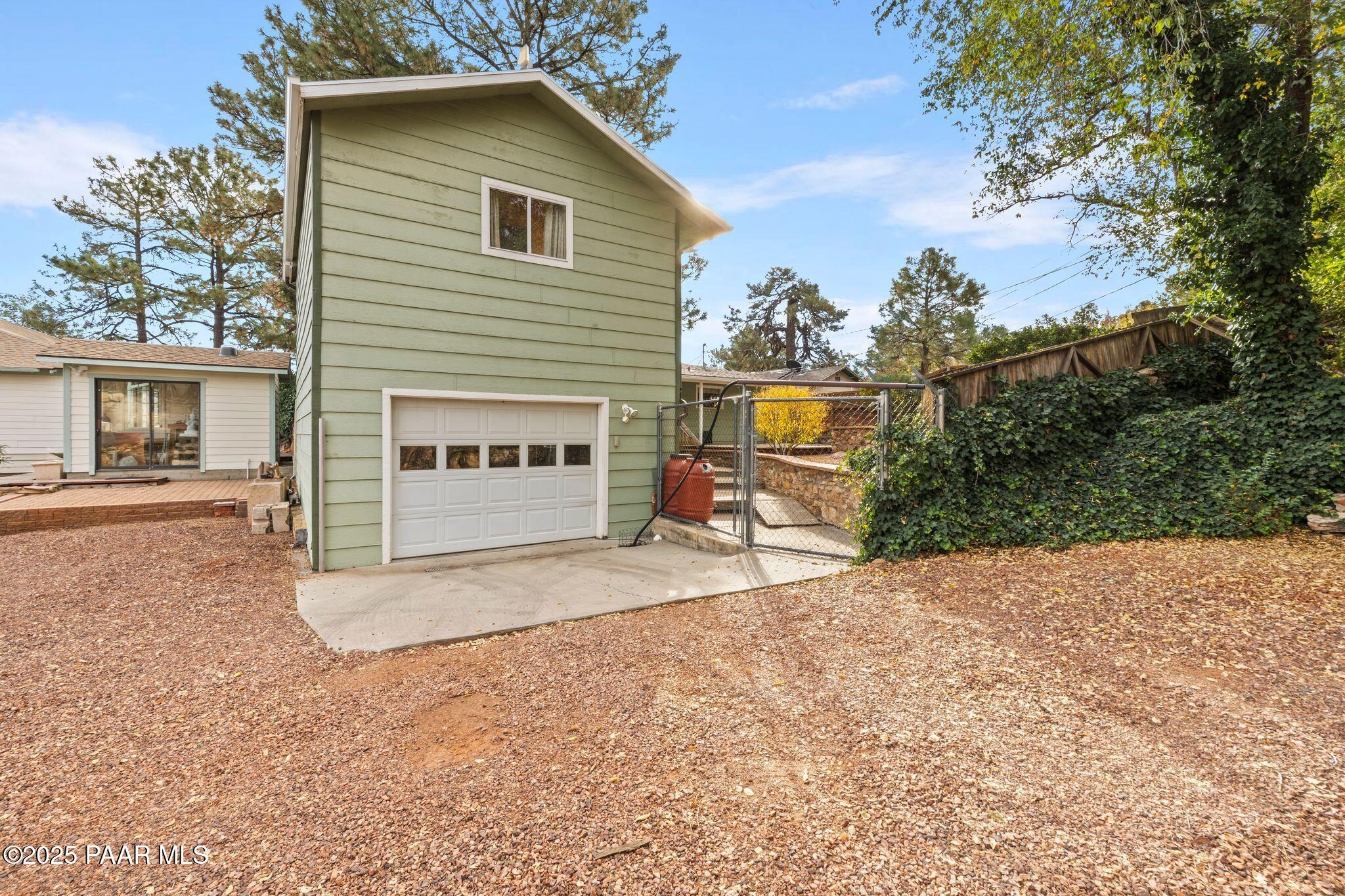 224 Congress Avenue Prescott, AZ 86303 - Photo 52 of 59 a view of a house with a yard and garage