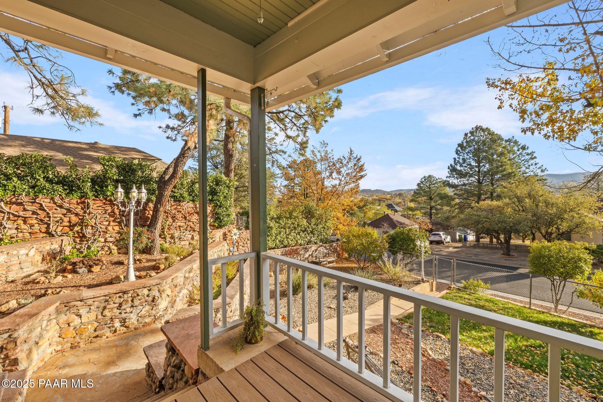 224 Congress Avenue Prescott, AZ 86303 - Photo 8 of 59 a view of a balcony with wooden floor and outdoor seating