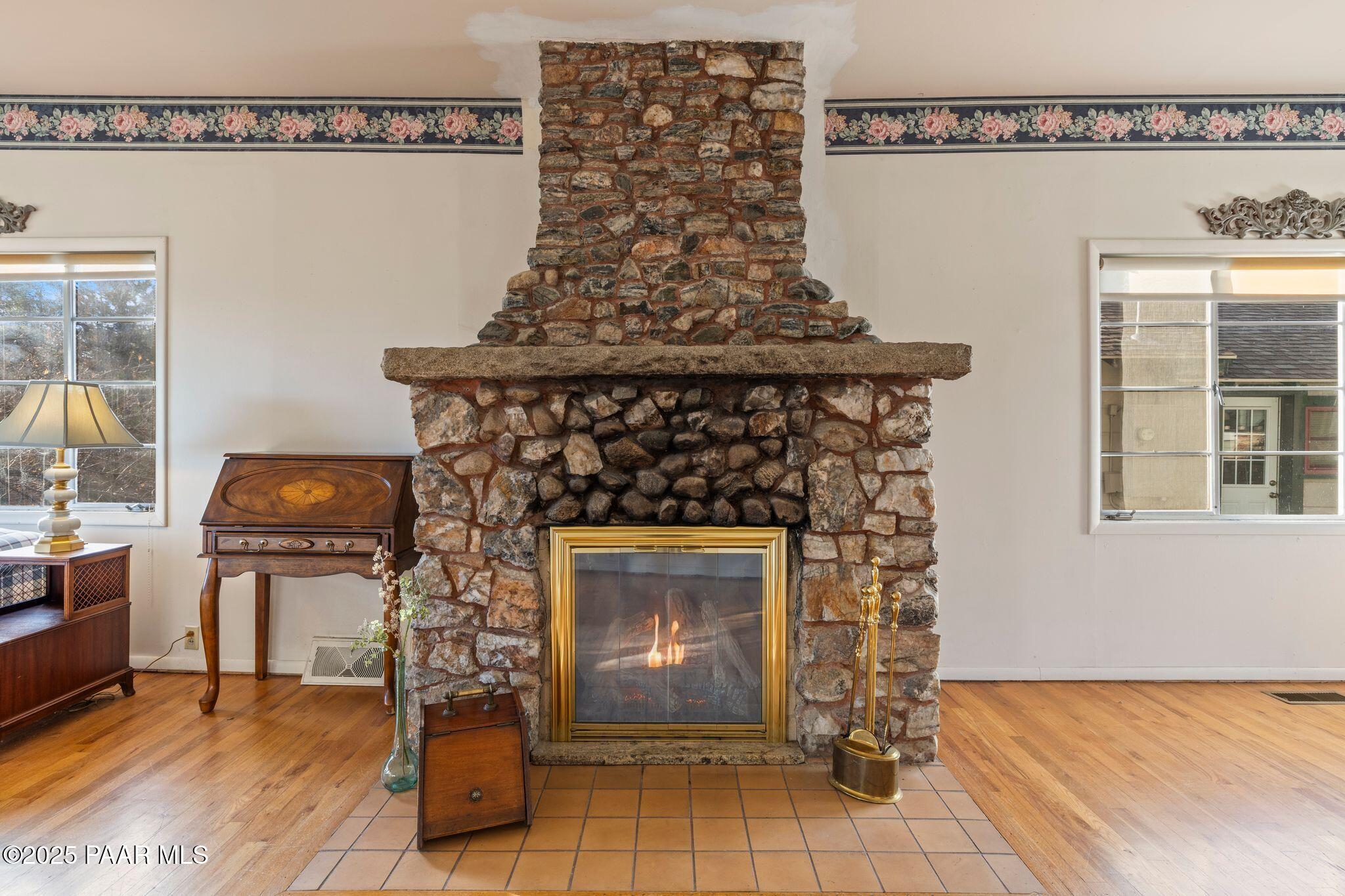 224 Congress Avenue Prescott, AZ 86303 - Photo 10 of 59 a living room with furniture and a fireplace