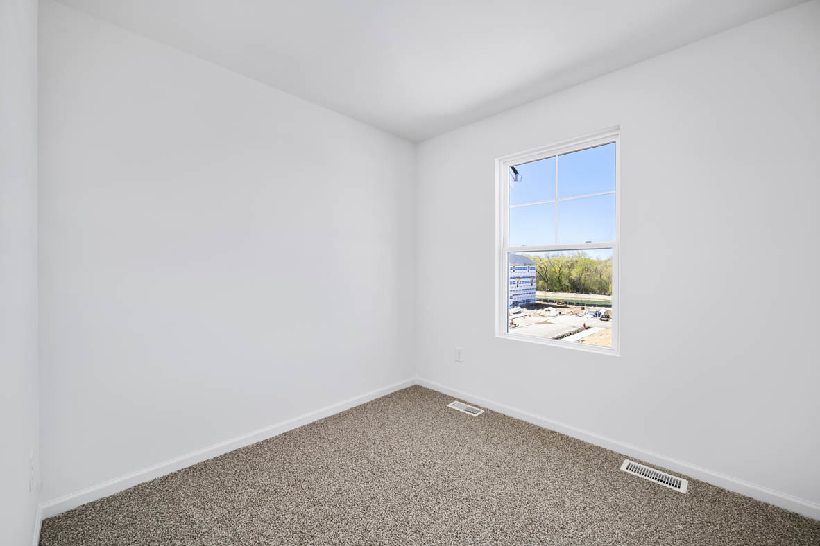 2121 Sassafras Way, Unit C Wonder Lake, IL 60097 - Photo 12 of 57 a view of an empty room and a window