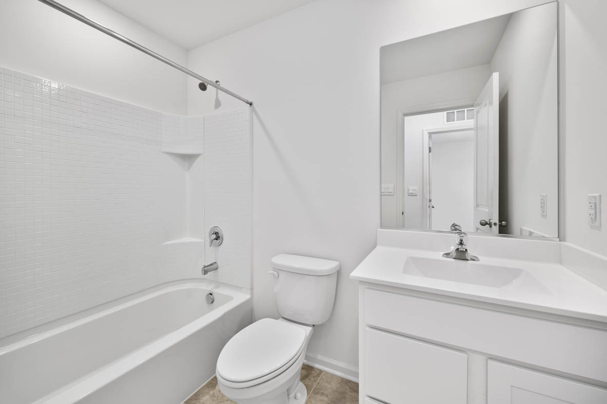 2121 Sassafras Way, Unit C Wonder Lake, IL 60097 - Photo 14 of 57 a bathroom with a sink toilet and shower