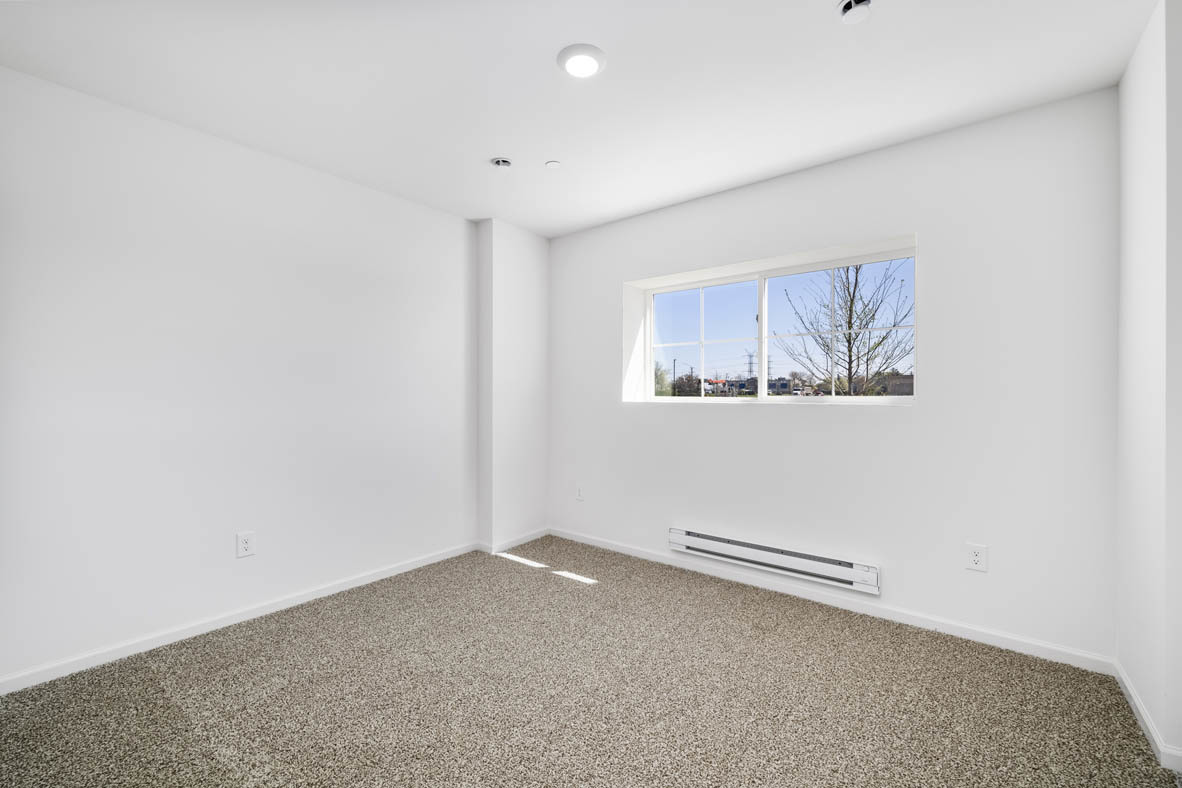 2121 Sassafras Way, Unit C Wonder Lake, IL 60097 - Photo 2 of 57 a view of a room with wooden floor and window