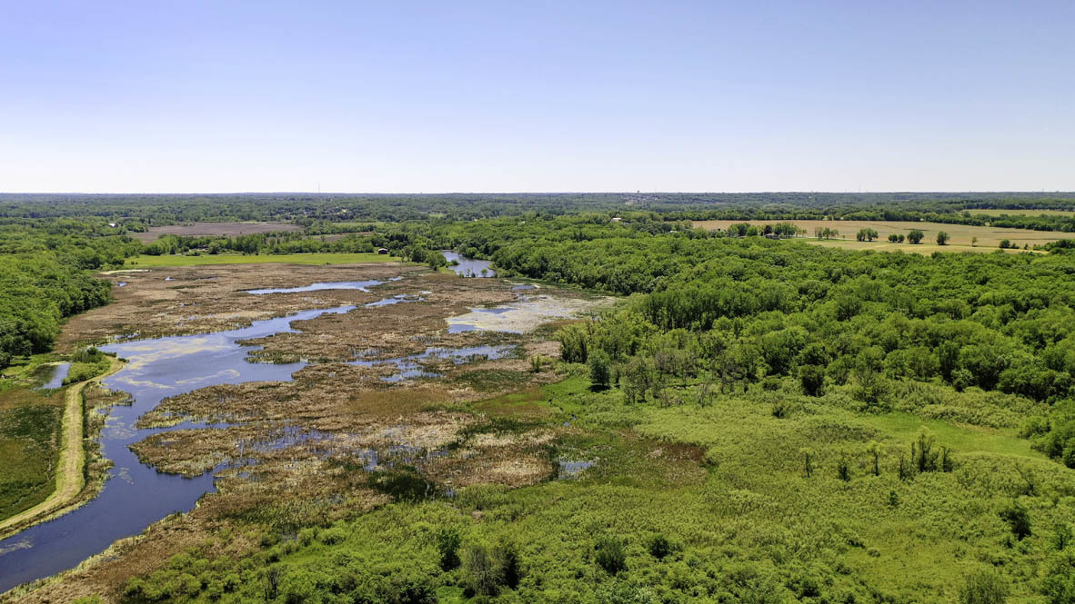 2121 Sassafras Way, Unit C Wonder Lake, IL 60097 - Photo 56 of 57 a view of a field with an ocean