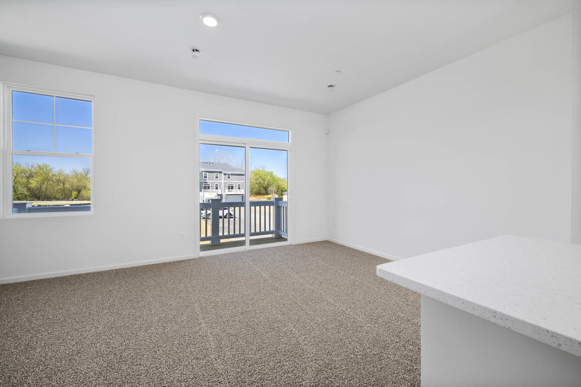 2121 Sassafras Way, Unit C Wonder Lake, IL 60097 - Photo 6 of 57 a view of an empty room with a window