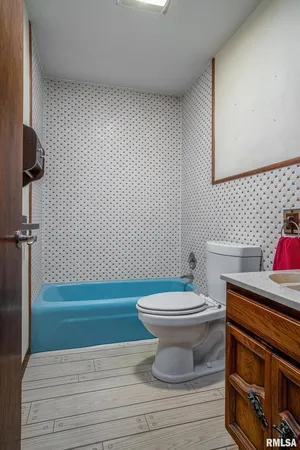 a bathroom with a sink and a toilet