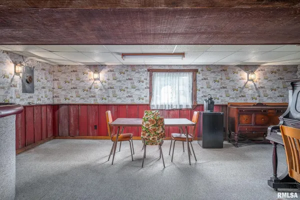 a kitchen with a stove and a refrigerator