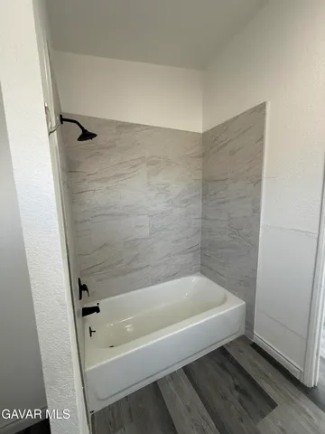 a bathroom with a bathtub