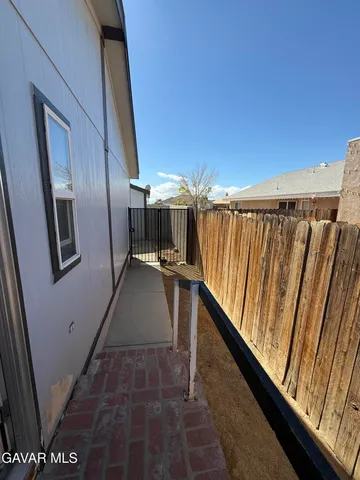 a view of balcony with furniture