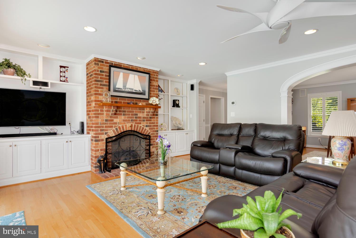 25474 Chance Farm Road St. Michaels, MD 21663 - Photo 20 of 52 Fireplace with gas logs flanked by built-ins