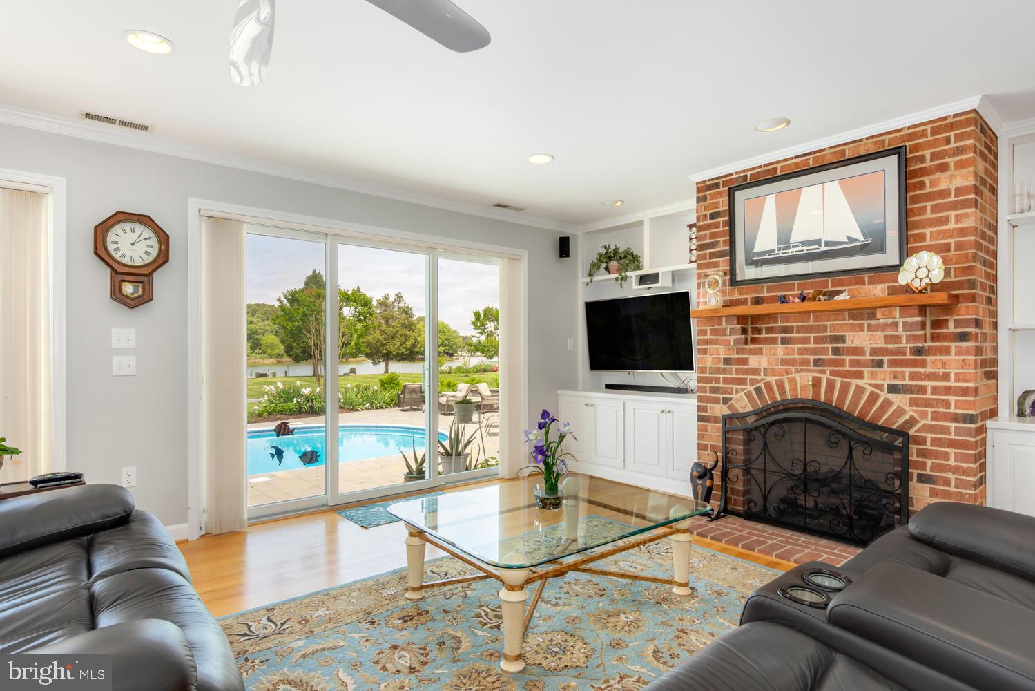 25474 Chance Farm Road St. Michaels, MD 21663 - Photo 21 of 52 Triple sliders overlooking the pool and water