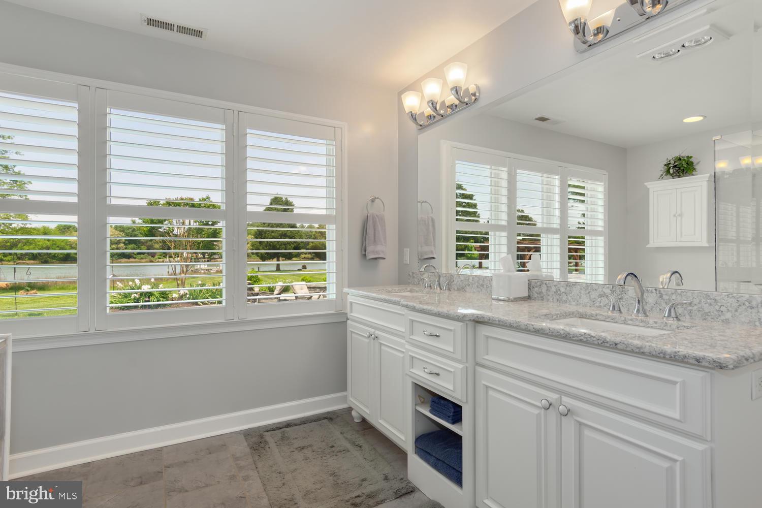 25474 Chance Farm Road St. Michaels, MD 21663 - Photo 38 of 52 Enjoy heated tile floor, vanity w ith 2 sinks...
