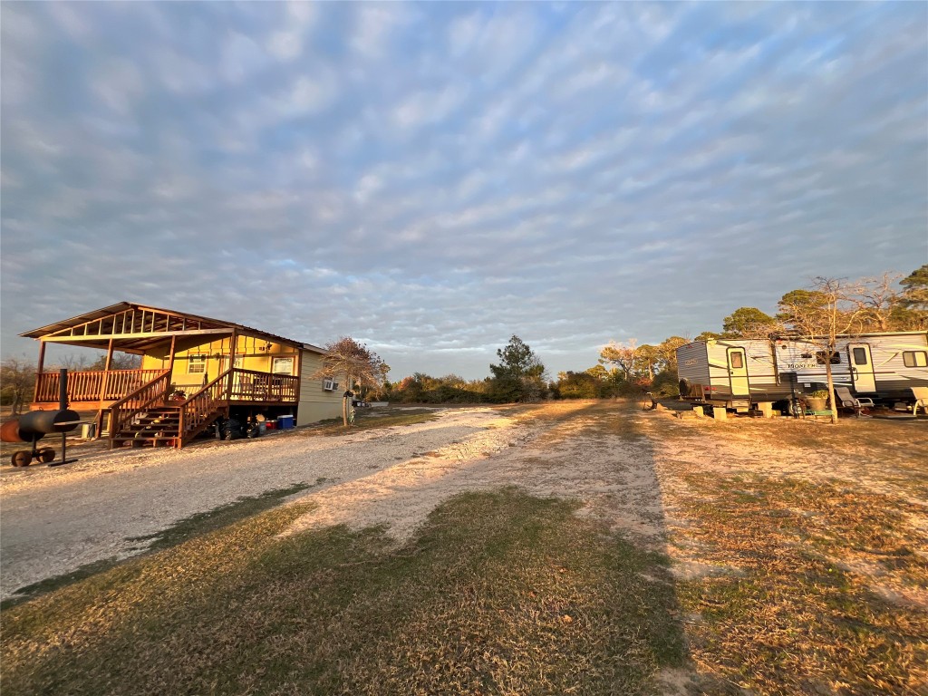 562 Pine Tree Loop, Unit B Bastrop, TX 78602 - Photo 3 of 18 a view of a house with a ocean view