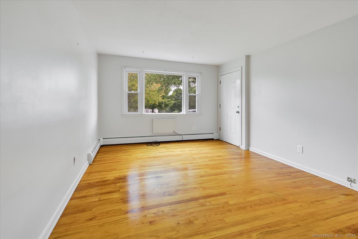 63 Maynard Street Middletown, CT 06457 - Photo 13 of 28 a view of an empty room with a window