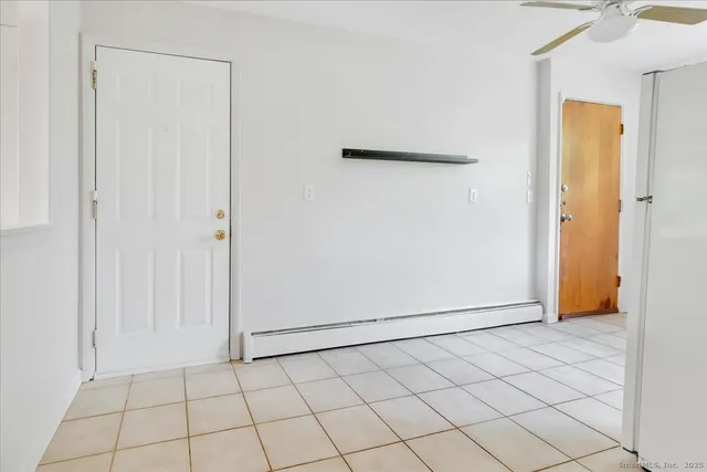 an empty room with cabinet