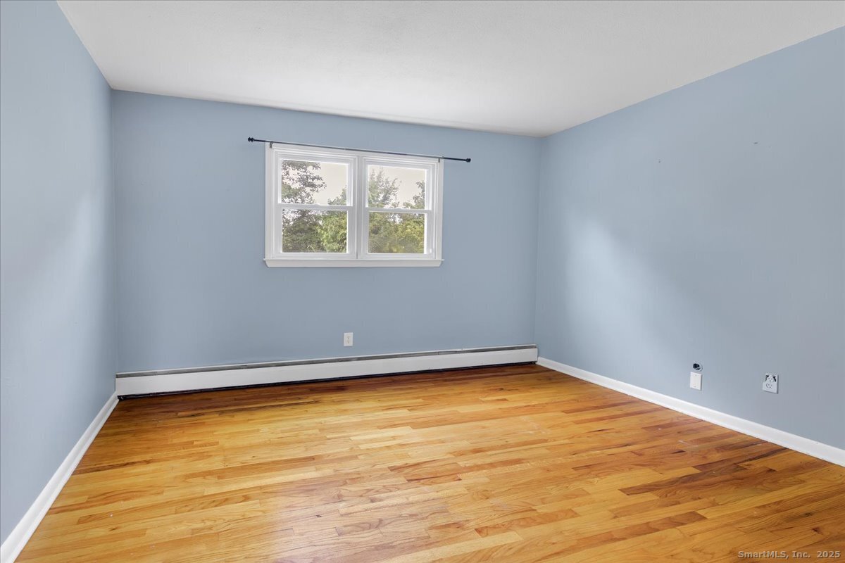 63 Maynard Street Middletown, CT 06457 - Photo 21 of 28 an empty room with a window