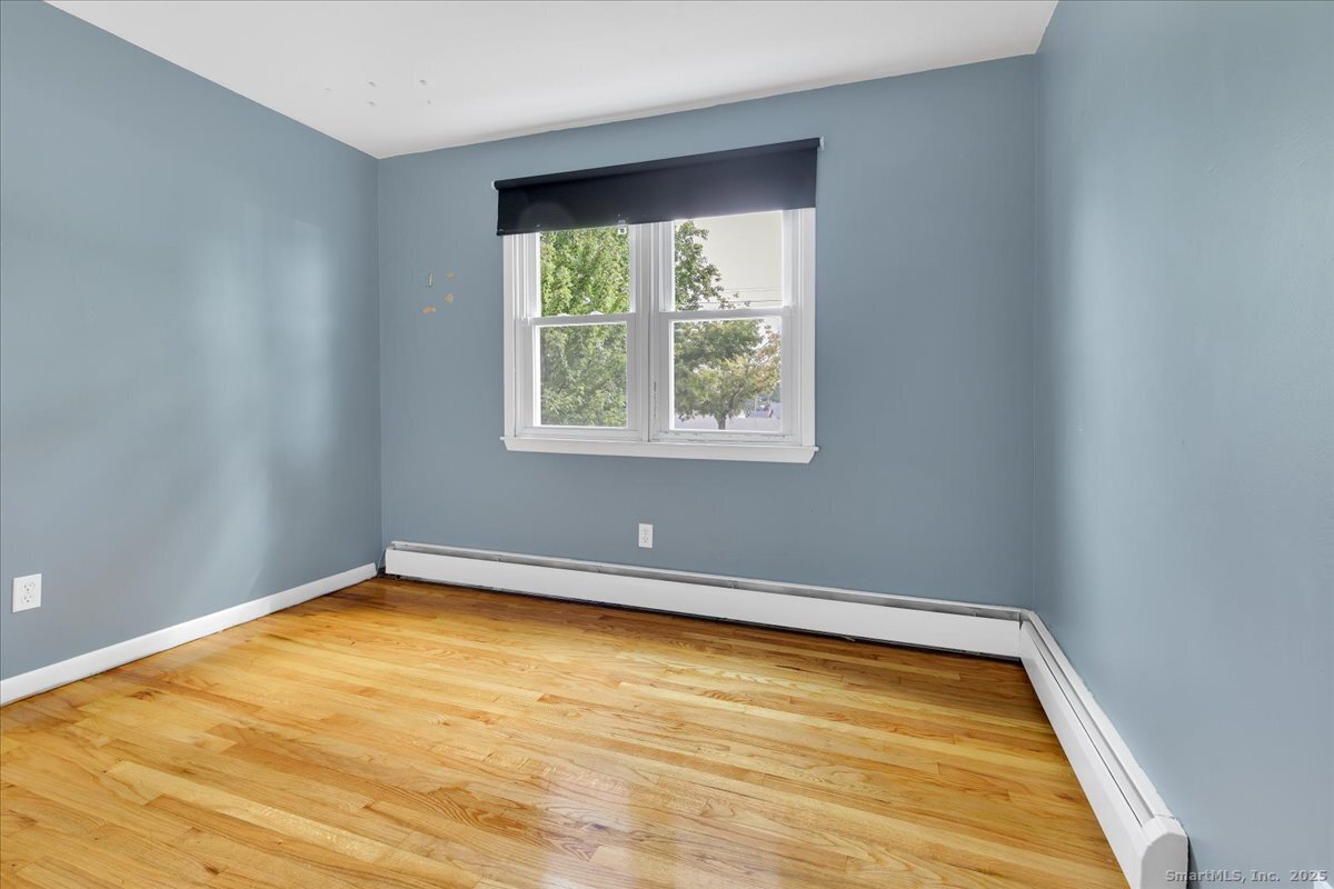 63 Maynard Street Middletown, CT 06457 - Photo 25 of 28 a view of an empty room with a window