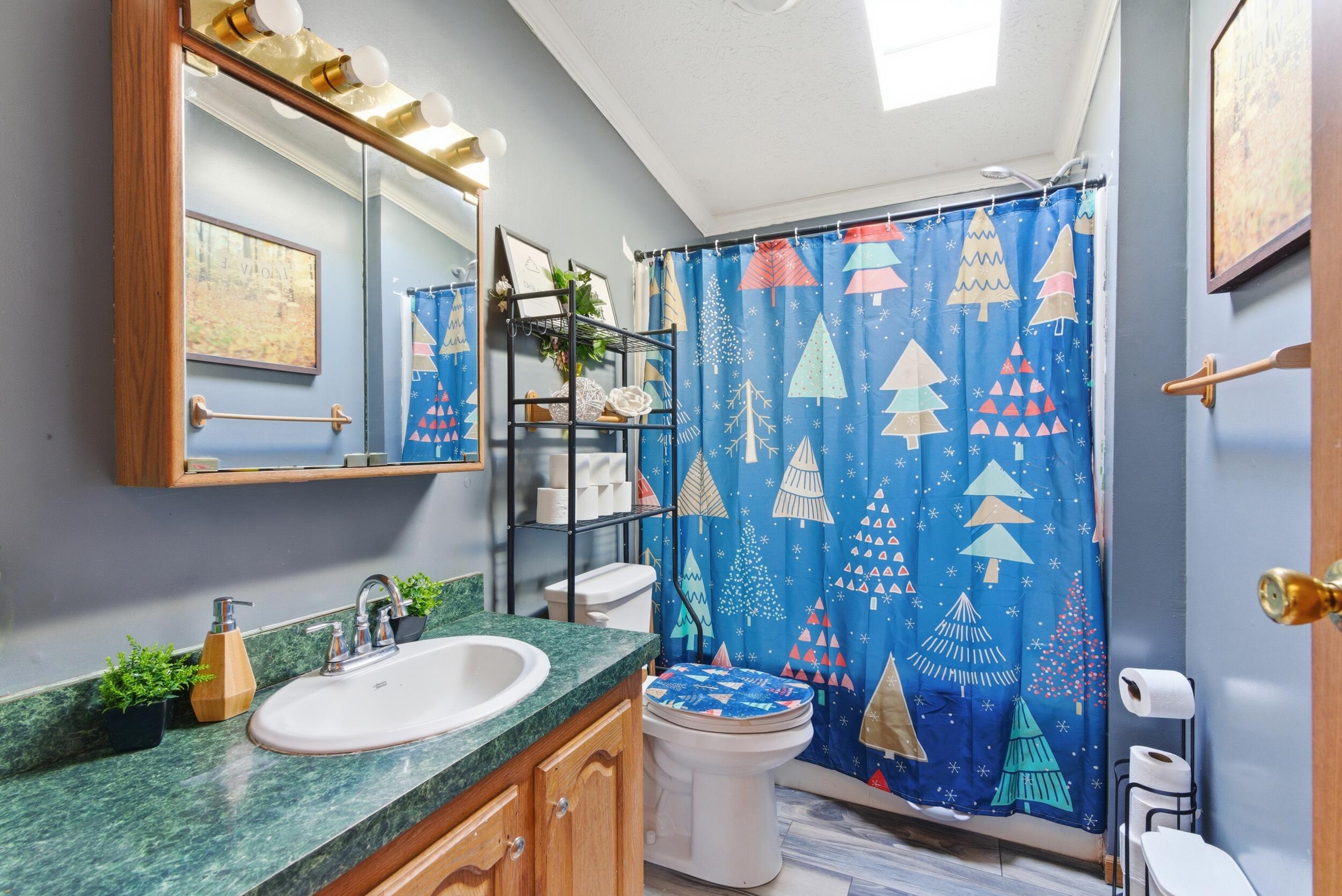 4827 East 994 North Demotte, IN 46310 - Photo 11 of 25 a bathroom with a granite countertop sink mirror vanity and toilet