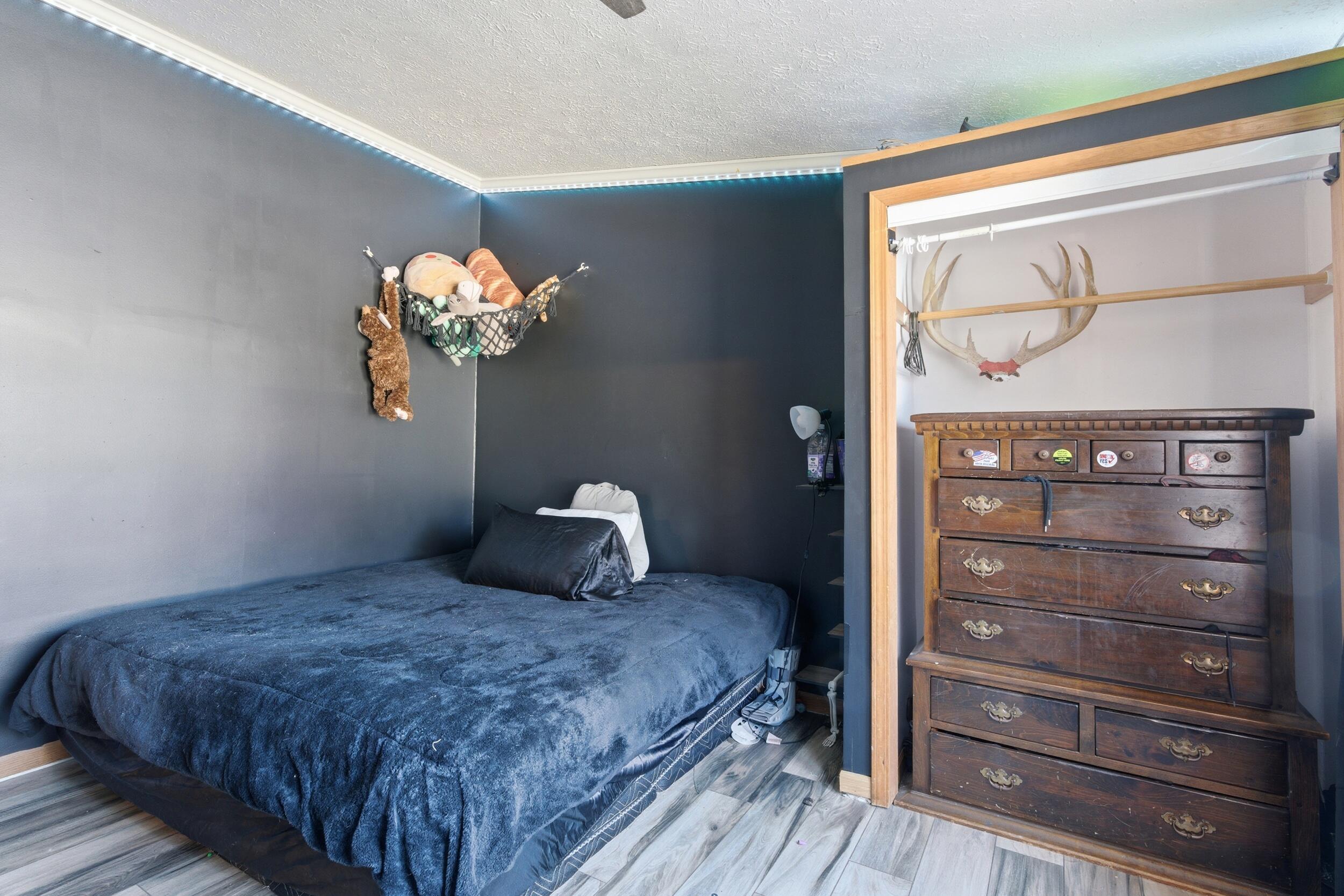 4827 East 994 North Demotte, IN 46310 - Photo 13 of 25 a bedroom with a bed and a window