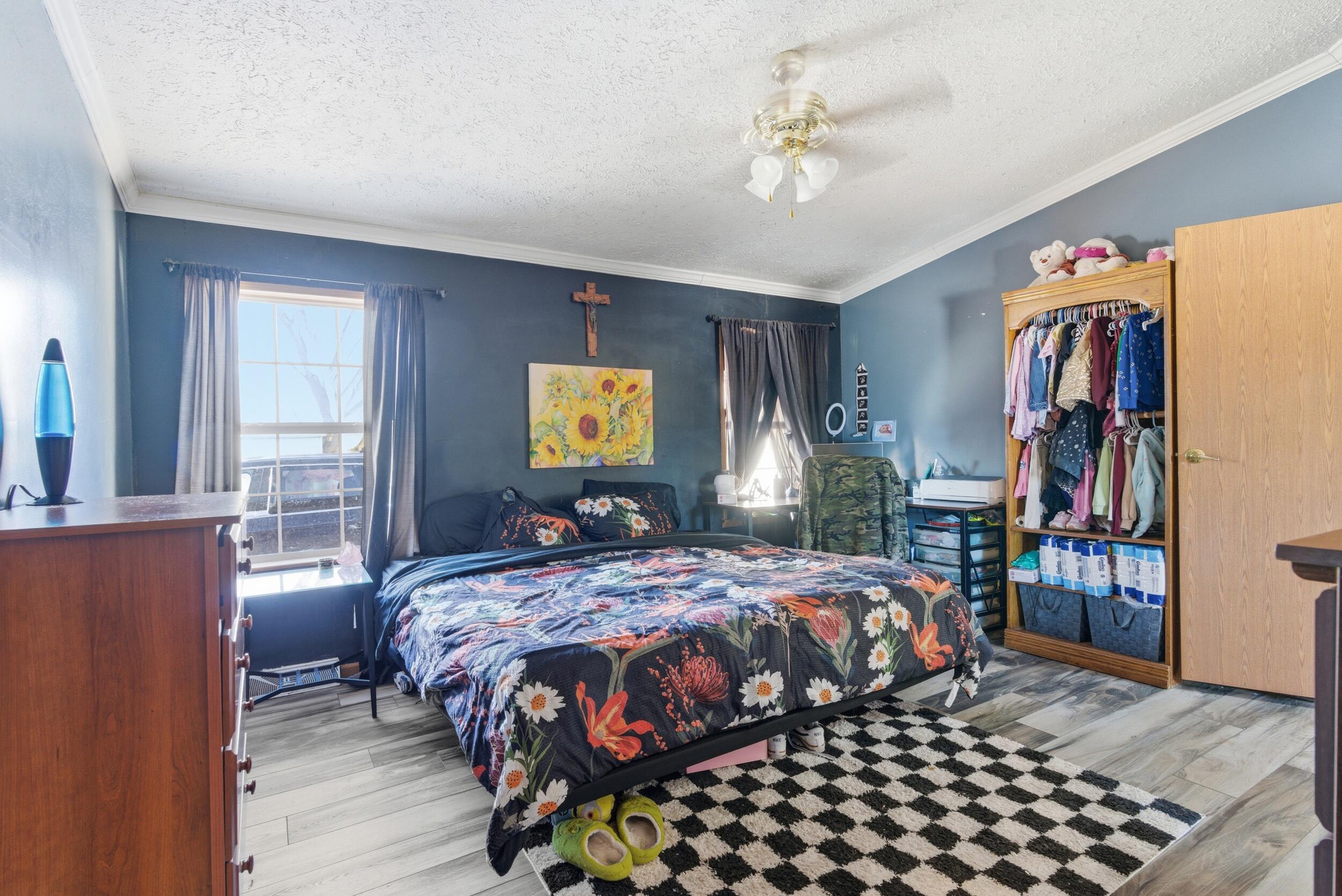 4827 East 994 North Demotte, IN 46310 - Photo 15 of 25 a bedroom with a bed and a window