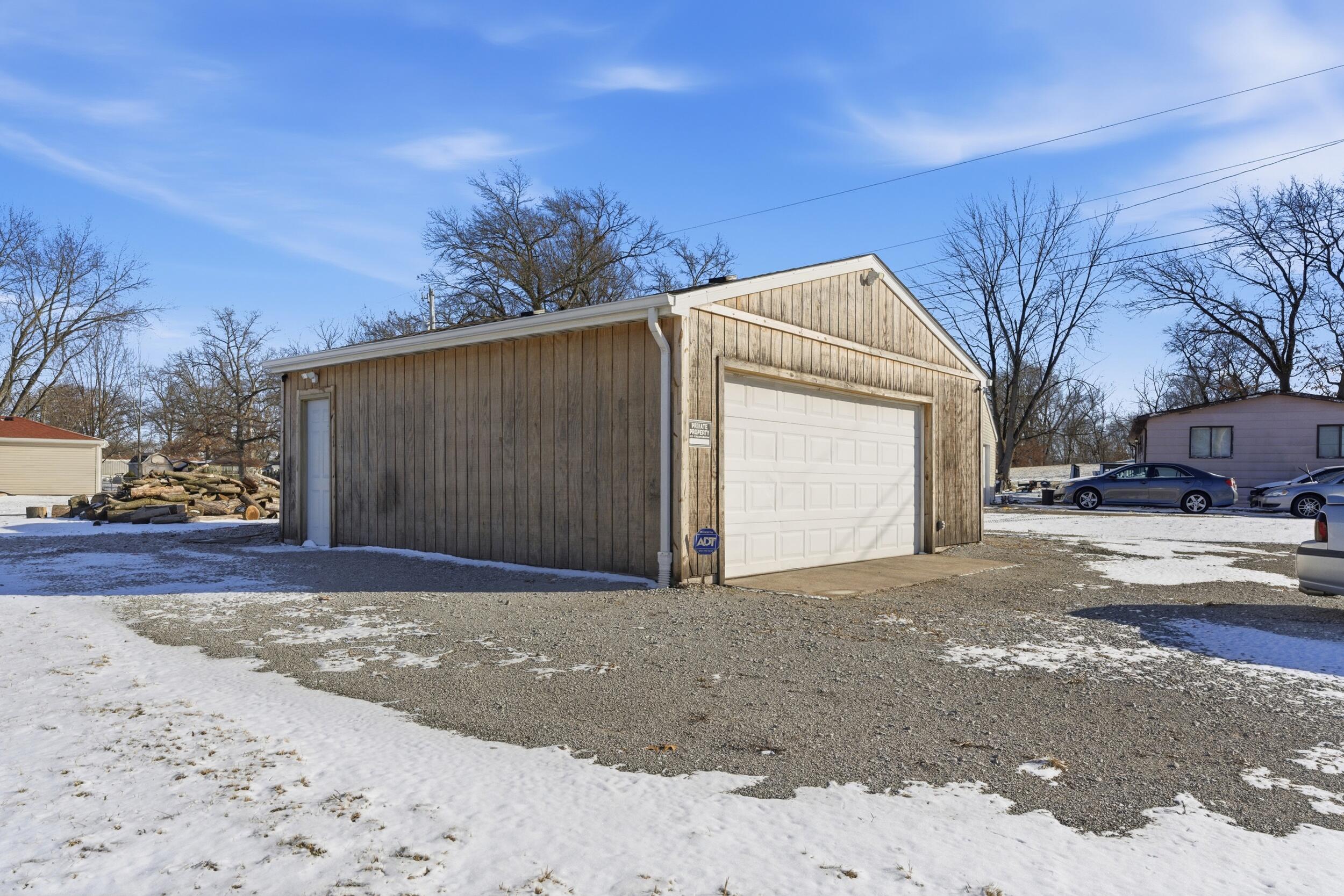 4827 East 994 North Demotte, IN 46310 - Photo 2 of 25 a view of street with large house