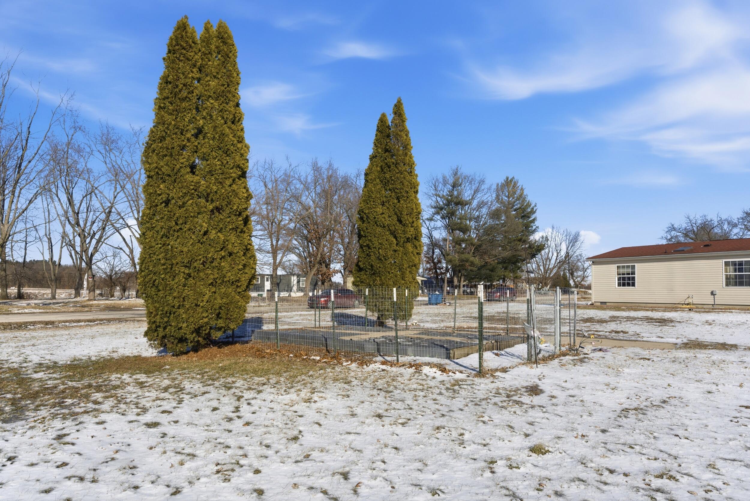 4827 East 994 North Demotte, IN 46310 - Photo 23 of 25 a view of a yard with a house