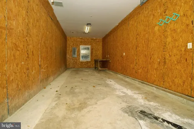 a view of a big room with windows