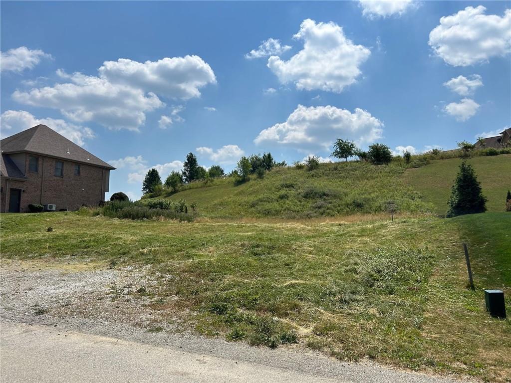3016 Chestnut Ridge Drive Jefferson Hills, PA 15025 - Photo 5 of 12 a view of a house with a yard