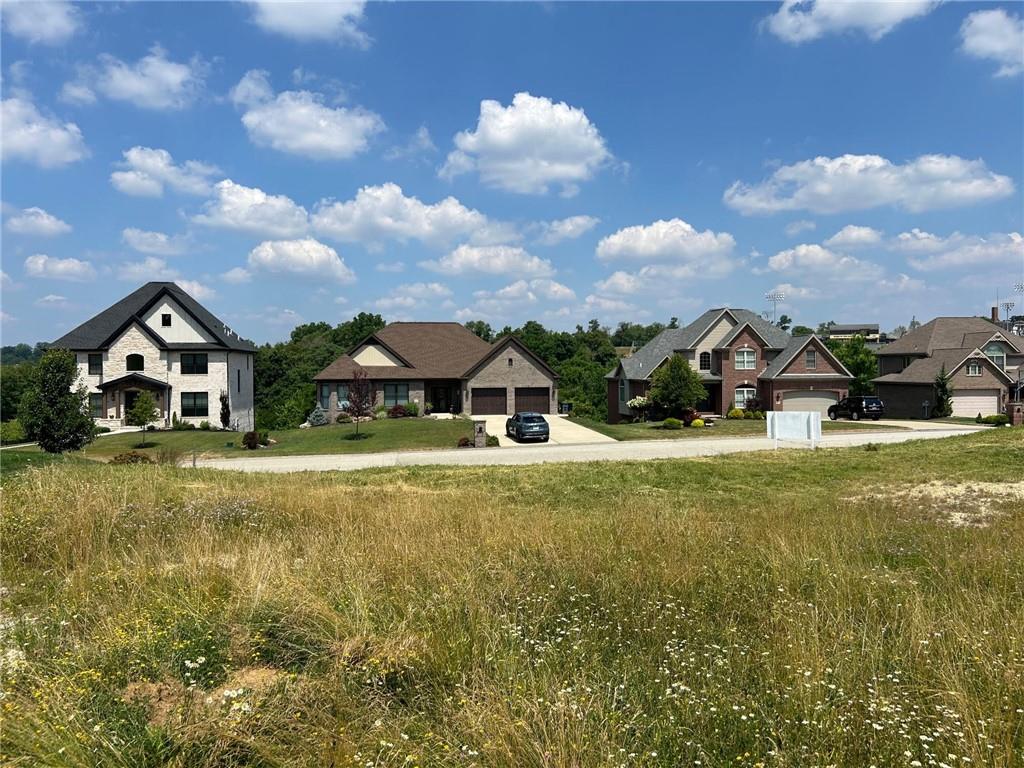 3016 Chestnut Ridge Drive Jefferson Hills, PA 15025 - Photo 7 of 12 a front view of house with outdoor space and sitting area
