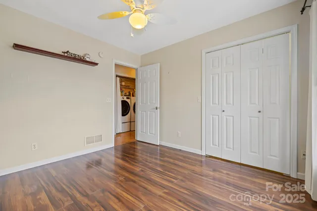 a view of a hallway view with staircase