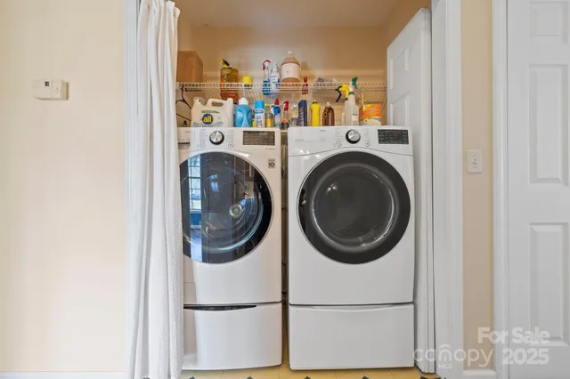 an aerial view of residential house with outdoor space and street view