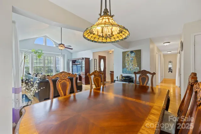 a kitchen with stainless steel appliances granite countertop a stove and a refrigerator