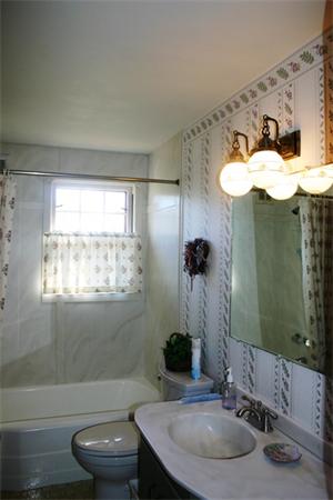 106 Mountain Road Wilbraham, MA 01095 - Photo 7 of 11 a bathroom with a sink and a mirror
