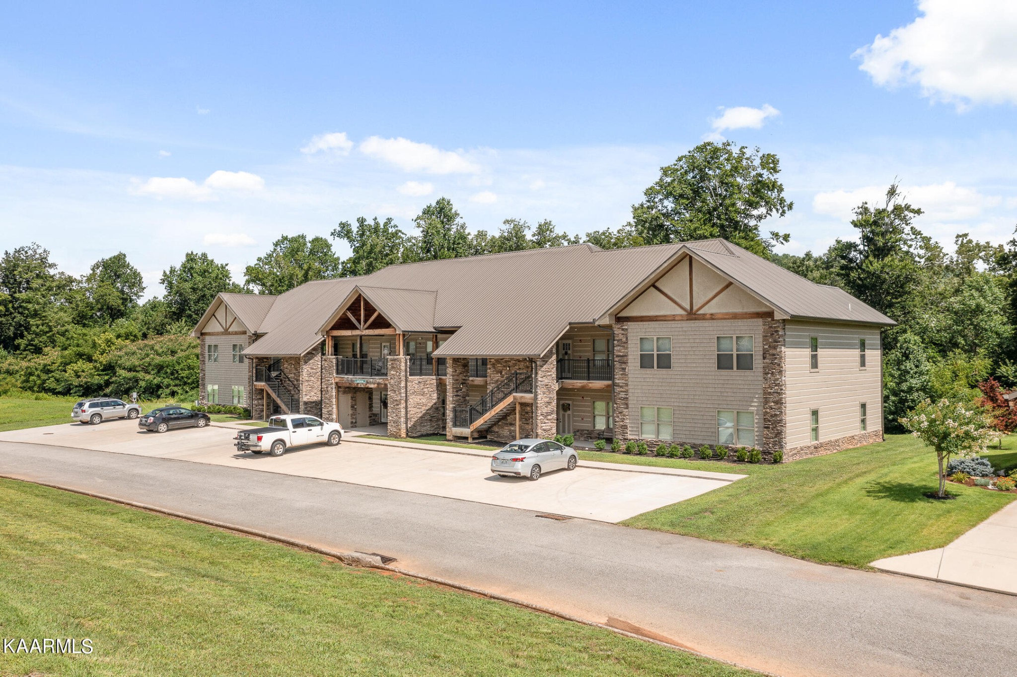 a view of house with yard and entertaining space