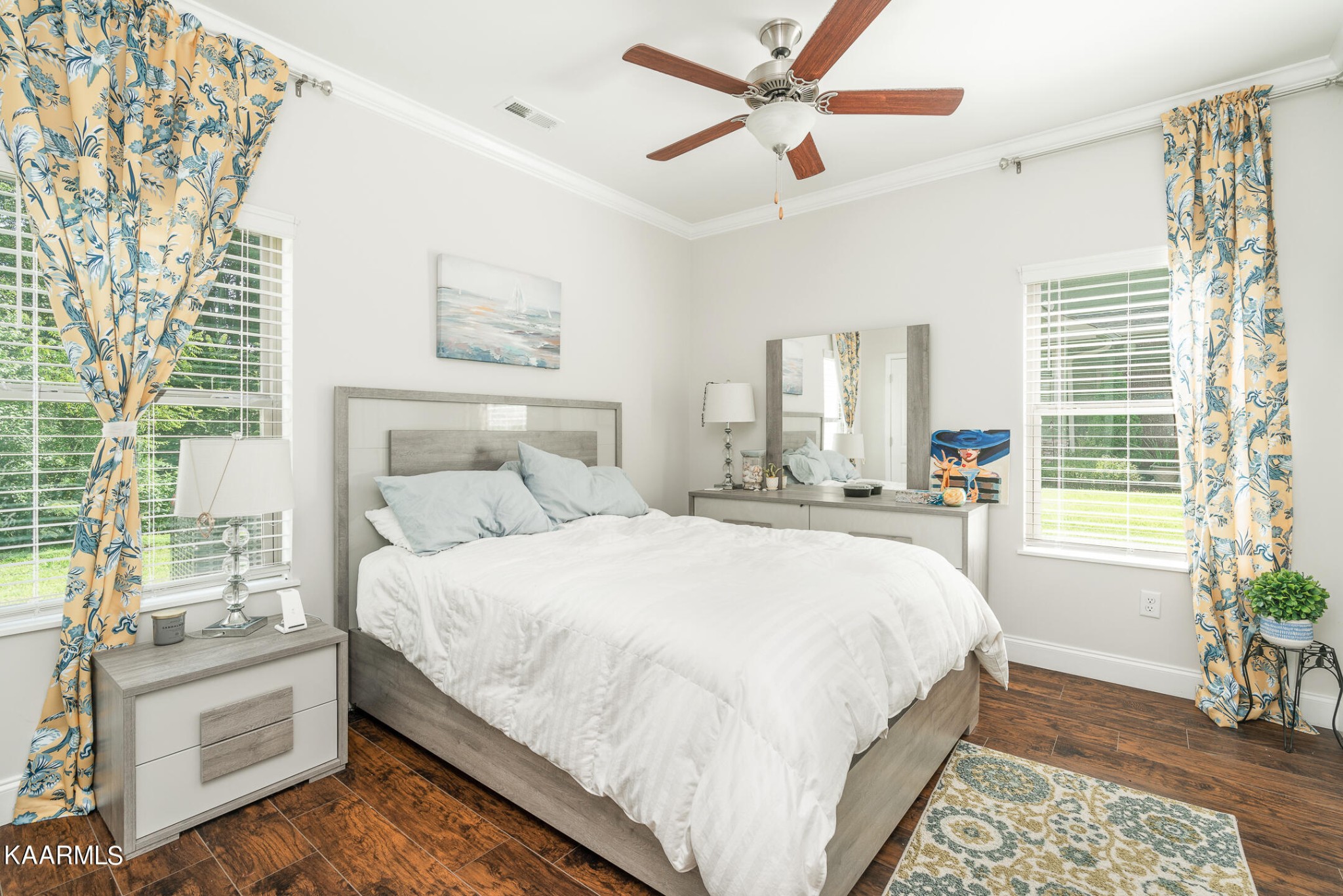 326 Shooting Star Loop, Unit 106 Townsend, TN 37882 - Photo 12 of 24 a bedroom with a large bed and a window