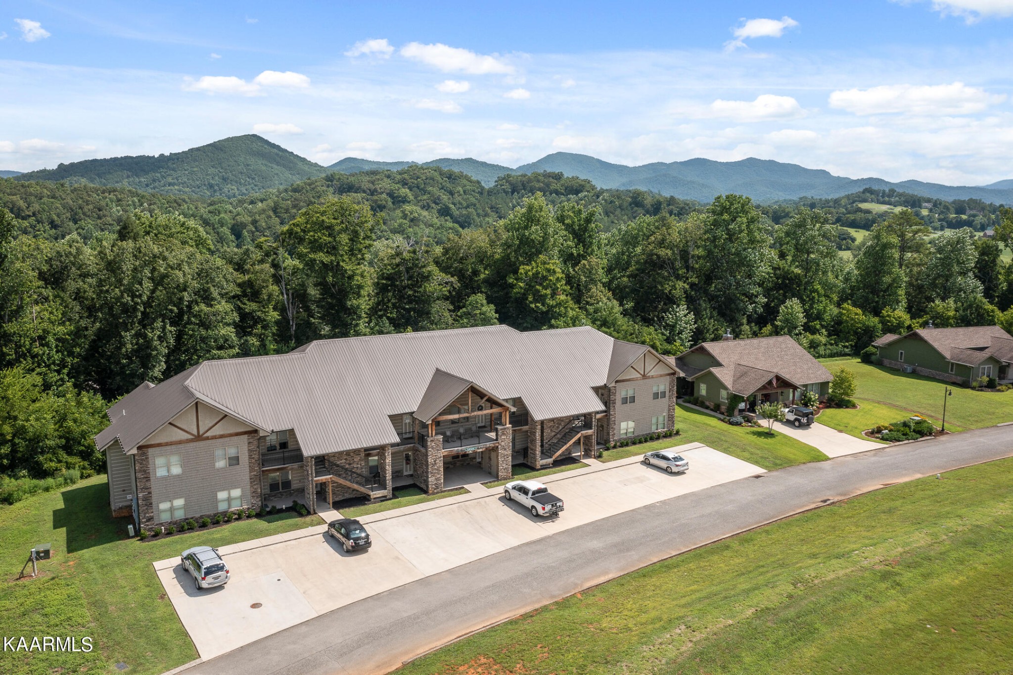 326 Shooting Star Loop, Unit 106 Townsend, TN 37882 - Photo 17 of 24 an aerial view of a house