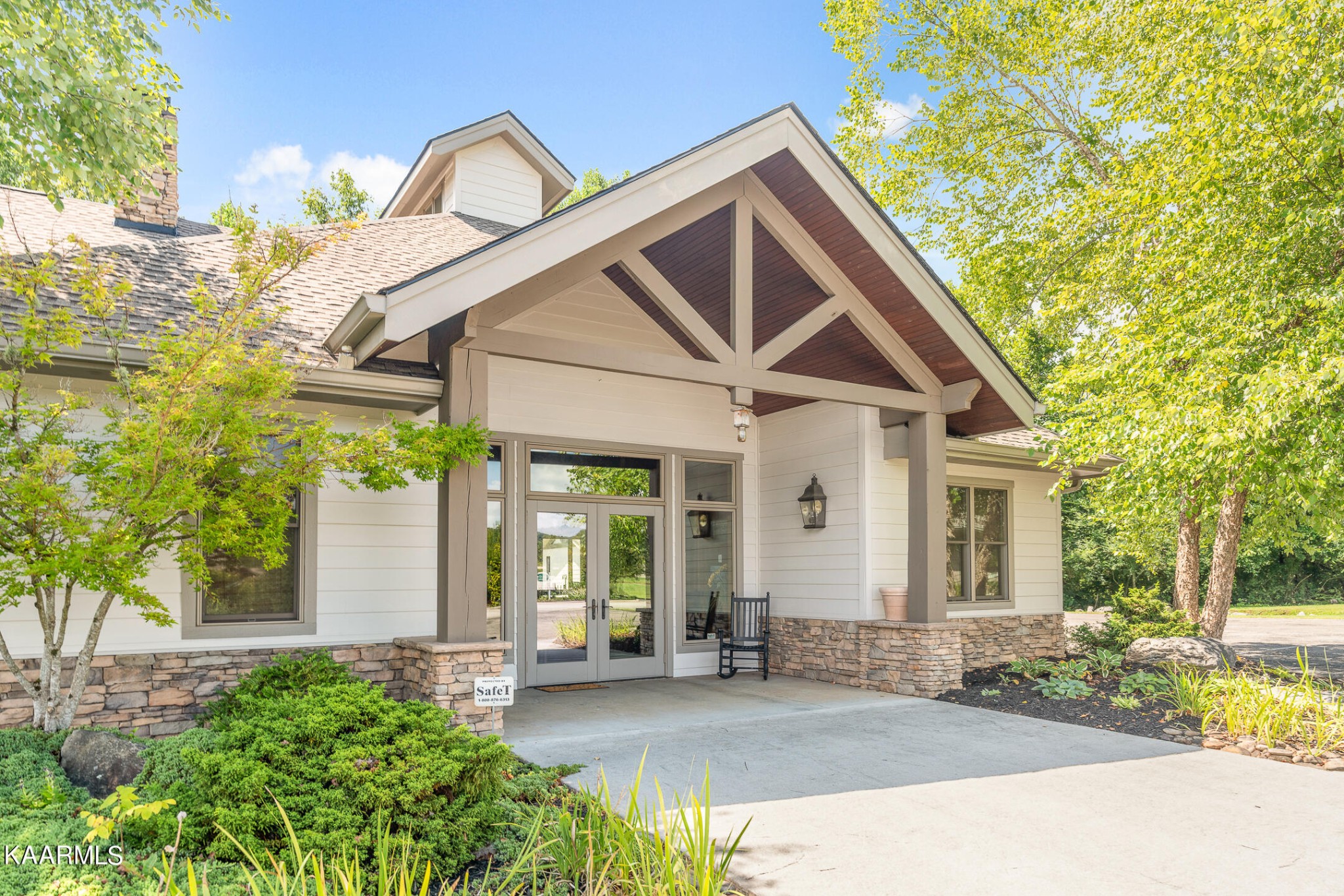 326 Shooting Star Loop, Unit 106 Townsend, TN 37882 - Photo 18 of 24 a front view of a house with a yard