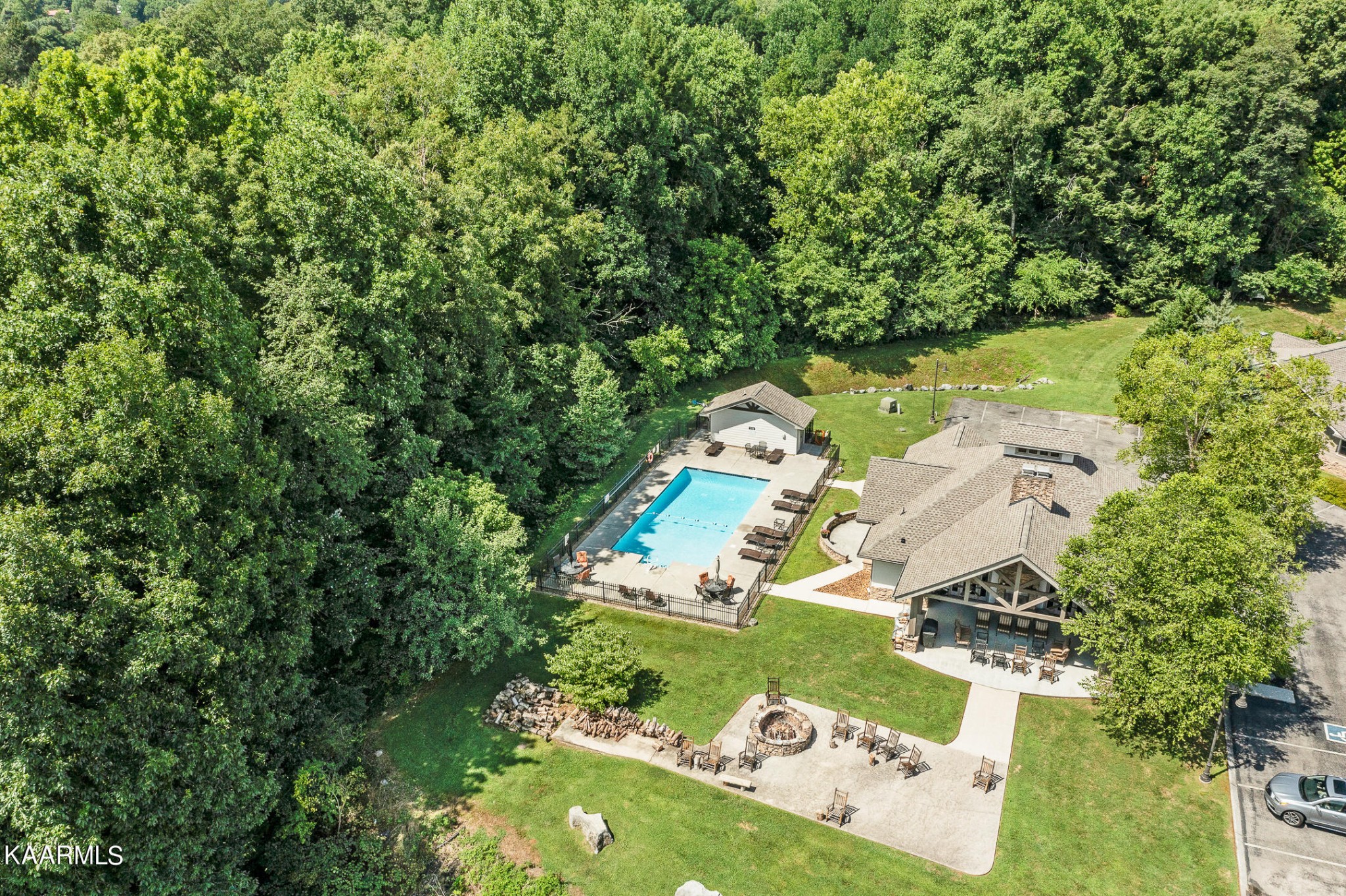 326 Shooting Star Loop, Unit 106 Townsend, TN 37882 - Photo 24 of 24 an aerial view of a house with a yard basket ball court