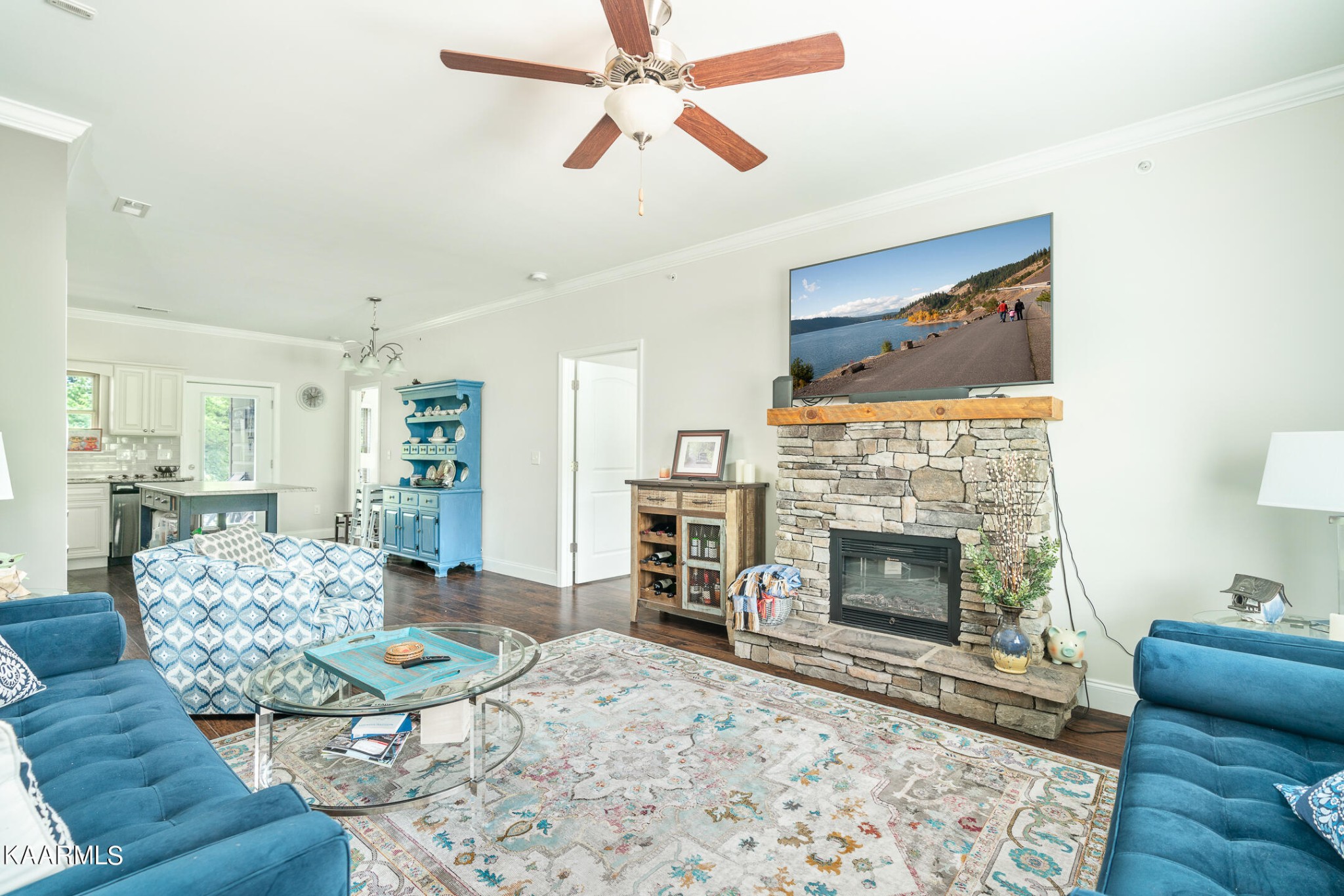 326 Shooting Star Loop, Unit 106 Townsend, TN 37882 - Photo 3 of 24 a living room with furniture and a fireplace