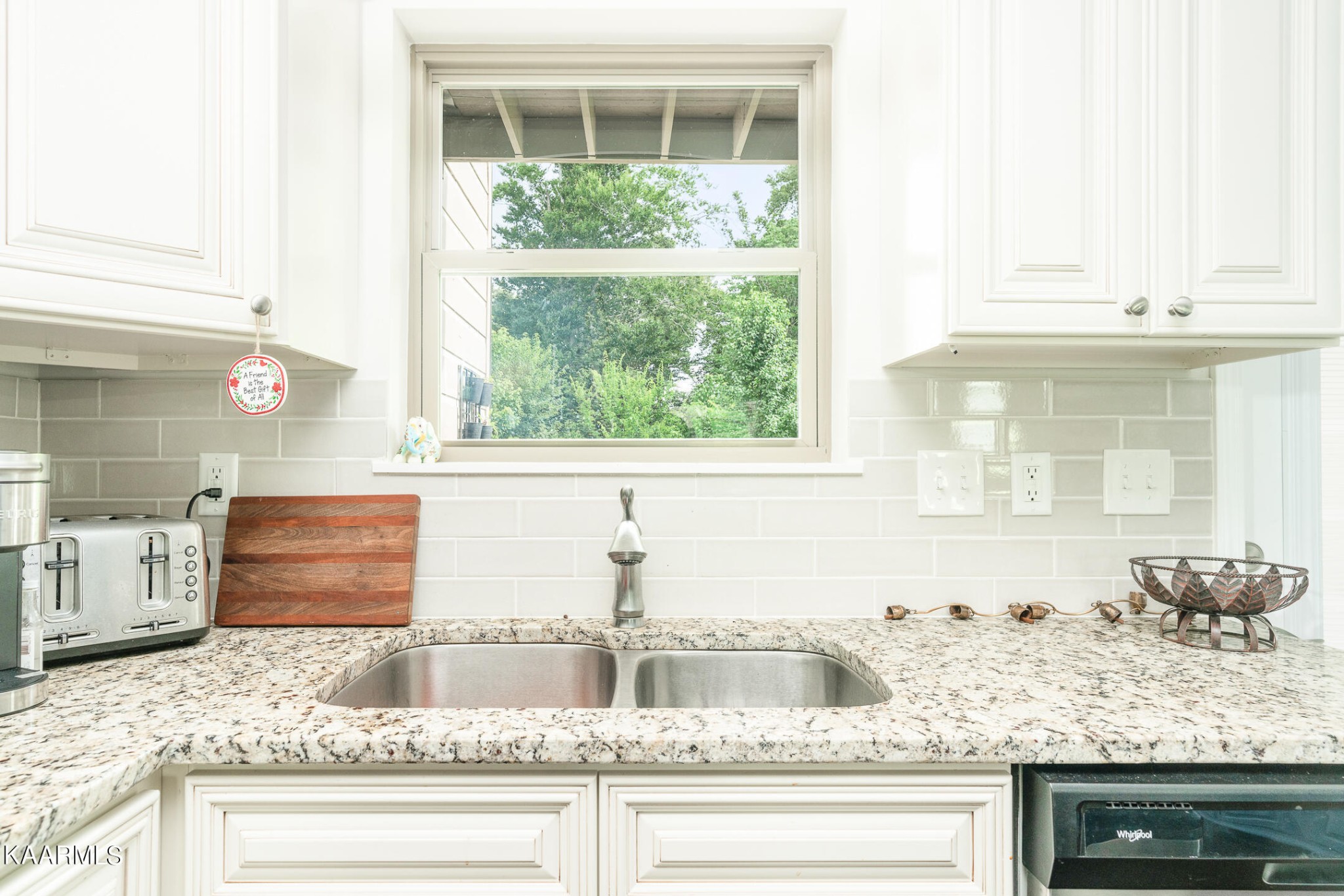 326 Shooting Star Loop, Unit 106 Townsend, TN 37882 - Photo 8 of 24 a bathroom with a granite countertop sink and a mirror